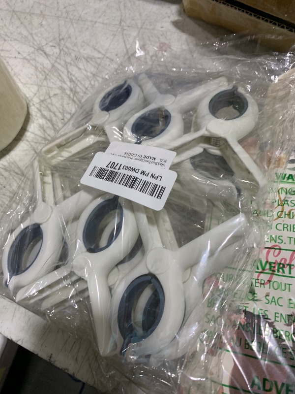 Photo 1 of 12 Pack Beach Towel Clips,Heavy-Duty Plastic Clothes Pins,Quilt Drying Clips,Windproof Clothes Clips,Keep Your Towel,Clothes,Blankets to Dry on Clothesline and Hanging Rack