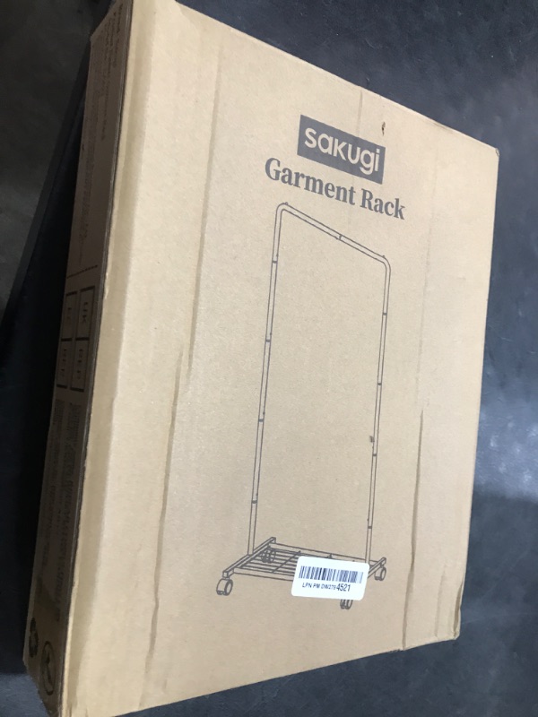 Photo 1 of Sakugi Clothes Rack - Clothing Rack with Storage Mesh Shelf & Casters, Heavy-Duty Metal Clothing Rack for Hanging Clothes, Dresses, Coats, Large Load Capacity, Easy Assembly, Black, 28.0"x14.0"x59.0"