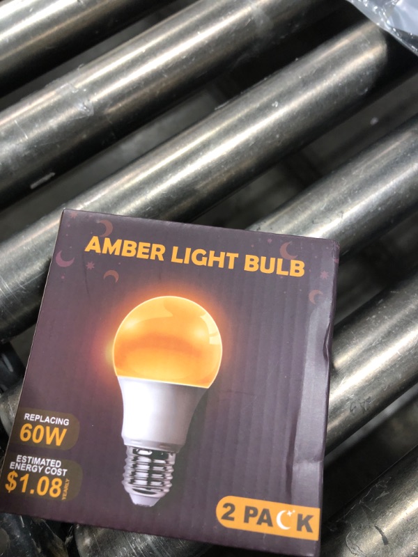 Photo 1 of DALUXshop Amber Sleep Light Bulbs, Blue Light Blocking, A19 9W(60 Watt Equivalent) Dim Light Bulbs for Lamp, 1800K Warm Light Bulb, E26 for Healthy Sleep, Bedroom, Kids Room, 2 Pack
