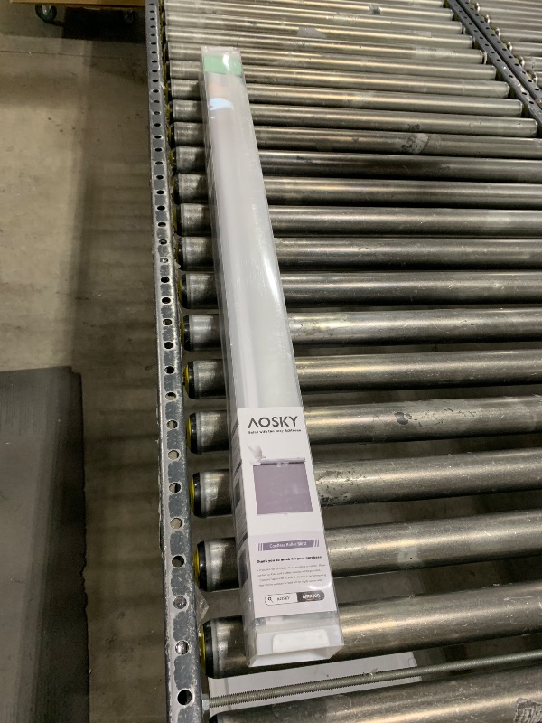 Photo 1 of AOSKY Cordless Roller Shades Blackout Blinds for Windows Room Darkening Rolled Up Shades (36" W x 72" H, White)