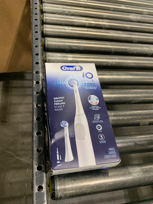 Photo 1 of Oral-B iO Series 2 Rechargeable Electric Powered Toothbrush Starter Kit, Pure White with 2 Brush Heads
