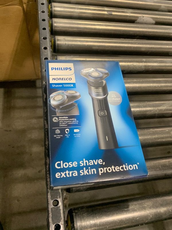 Photo 1 of Philips Norelco Shaver 5000X, Rechargeable Wet & Dry Shaver with Precision Trimmer and Storage Pouch