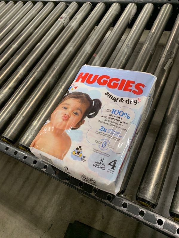 Photo 1 of Huggies Size 4 Diapers, Snug & Dry Baby Diapers, Size 4 (22-37 lbs Packs of 31)