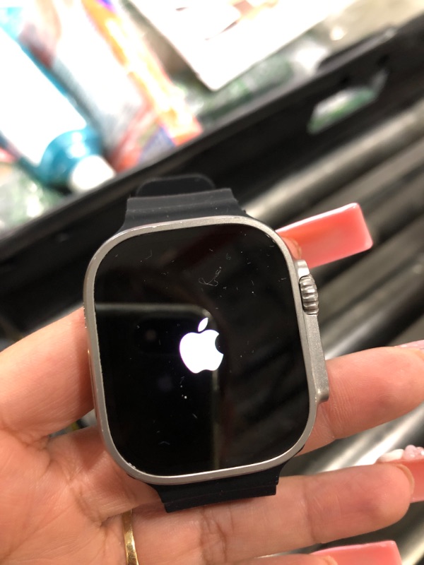 Photo 1 of Apple Watch Ultra [GPS + Cellular 49mm] Titanium Case with Midnight Ocean Band, One Size (Renewed Premium)