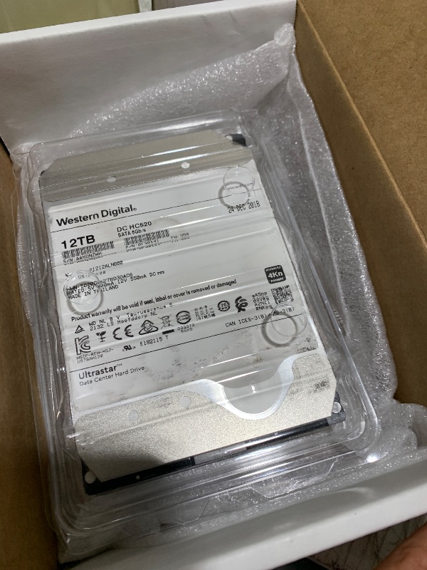 Photo 1 of WD Ultrastar DC HC520 12TB SATA 6Gb/s 3.5-Inch Data Center HDD - HUH721212ALE600 0F29590 (Renewed)