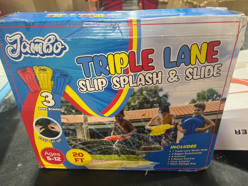 Photo 1 of triple lane slip  splash & slide 
