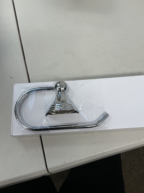 Photo 1 of Moen Preston Collection Chrome Single Post Toilet Paper Holder, Wall Mounted Hanging Toilet Tissue Holder, DN8408CH