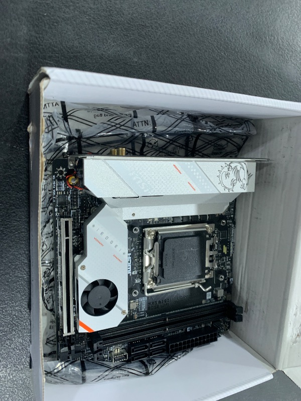 Photo 1 of MSI MPG B650I Edge WiFi Gaming Motherboard (AMD Ryzen 9000/8000/7000 Series Processors, AM5, DDR5, PCIe 4.0, M.2, SATA 6Gb/s, USB 3.2 Gen 2, HDMI, Wi-Fi 6E, Bluetooth 5.3, 2.5Gbps LAN, Mini-ITX)