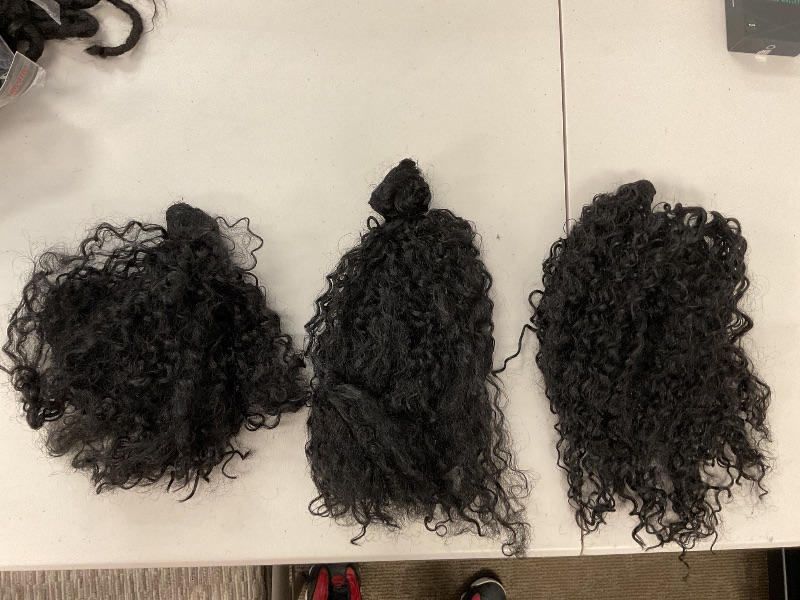 Photo 1 of Human Hair Bundles 12A Water Wave 3 Bundles 12 inch Wet and Wavy Human Weave Bundle Natural Curly Hair Extensions