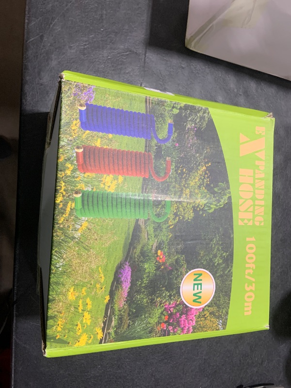 Photo 1 of 100 ft Expandable Garden Hose - Durable 3750D Fabric, 4-Layer Latex Core, Solid Brass Connectors Expanding Water Hose - 10 Spray Nozzles & Convenient Storage Bag Included