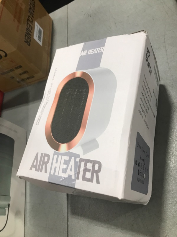 Photo 1 of QQT Electric Space Heater,Portable Energy Efficient Space Heaters for Indoor Use,Two-Speed Portable Heater Fan for Office with Adjustable,Overheating Protection,Dumping Shutdown (White)