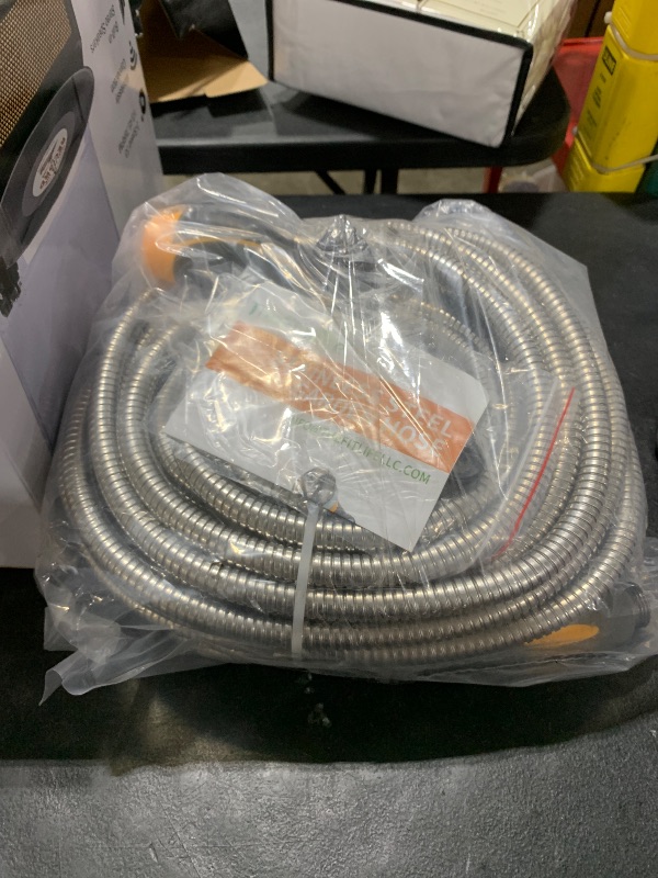 Photo 1 of TheFitLife Flexible Metal Garden Hose - 100FT Lightweight Stainless Steel Water Hose with Solid Fittings and Sprayer Nozzle - Leak Proof, Kink Free, Anti-rust, Large Diameter, Durable and Easy Storage