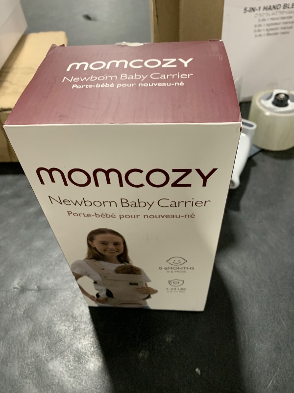 Photo 1 of Momcozy Newborn Baby Carrier - Ergonomic, Cozy and Lightweight Carrier for 7-24lbs, Adjustable Neck Support with Sunshield, Breathable Airmesh Perfect for Summer Outing, Khaki