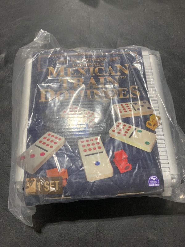 Photo 1 of Spin Master Games, Mexican Train Dominoes Set in Aluminum Carry Case, Includes Colorful Trains for Fun-Filled Family Game Night, for Kids & Family, 2-8 Players, for Ages 8 & Up