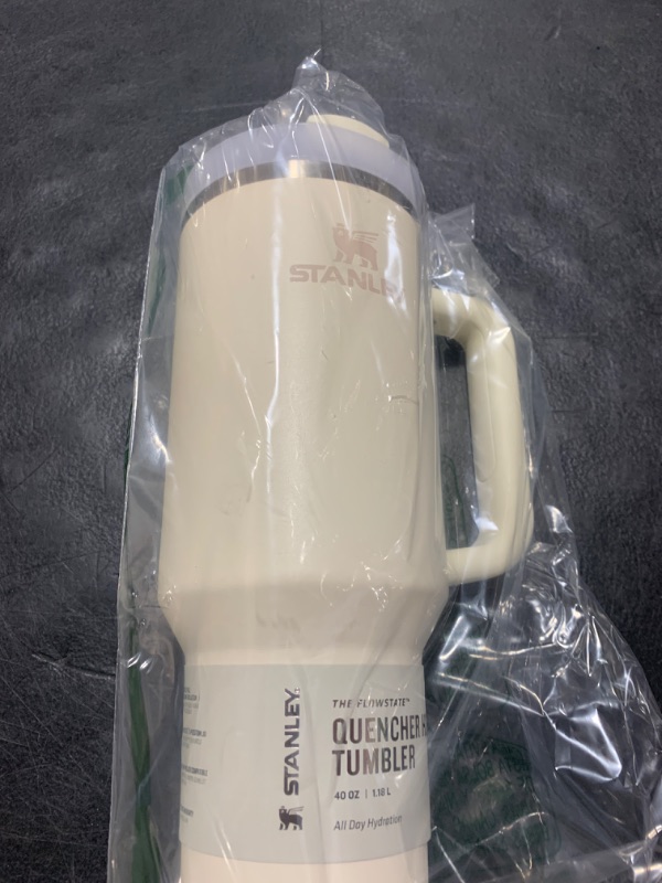 Photo 1 of Stanley Quencher H2.0 Tumbler with Handle and Straw 40 oz | Flowstate 3-Position Lid | Cup Holder Compatible for Travel | Insulated Stainless Steel Cup | BPA-Free | Cream 2.0
