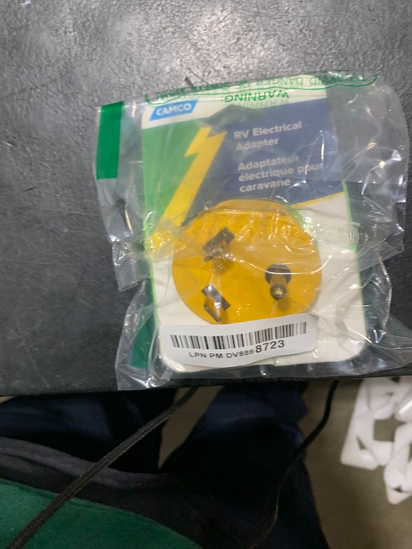 Photo 1 of Camco PowerGrip Camper/RV Adapter - Features a 15-Amp Male (NEMA 5-15P) & 30-Amp Female (NEMA TT-30R) Connection - Rated for 125V/1875W (55223)