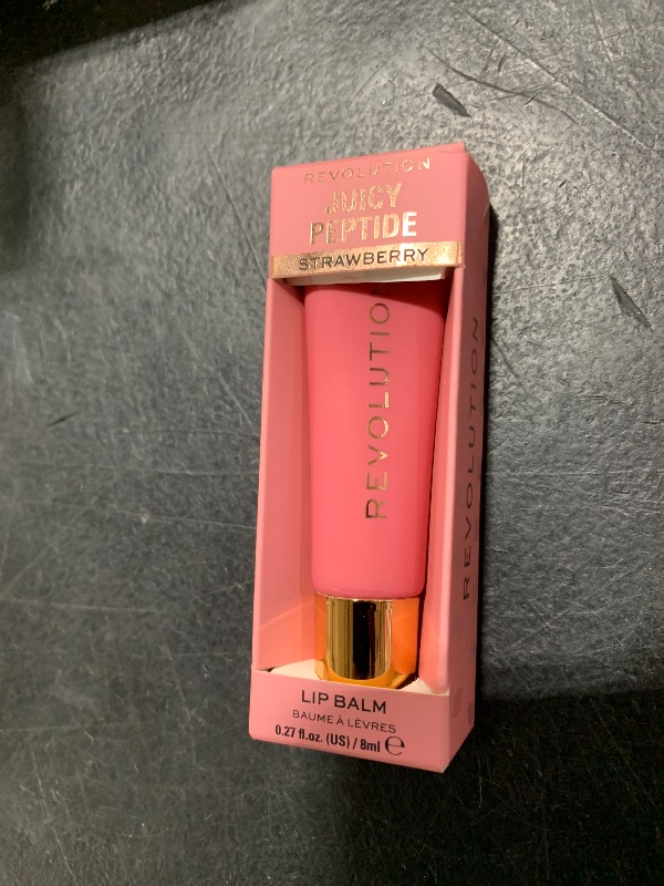 Photo 1 of Revolution Beauty, Juicy Peptide Lip Balm, Hydrating & Plumping Lip Balm with Sheer Color, Infused with Vitamin E & Peptides, Pink Strawberry, 0.27 Fl. Oz