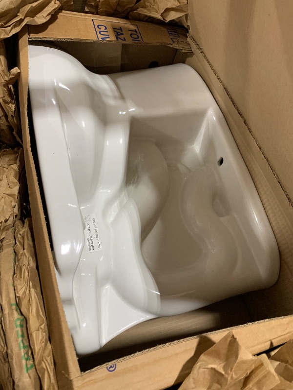 Photo 1 of TOTO Drake Two-Piece Elongated 1.6 GPF TORNADO FLUSH Toilet with CEFIONTECT, Cotton White - CST776CSG#01--- tank not included
