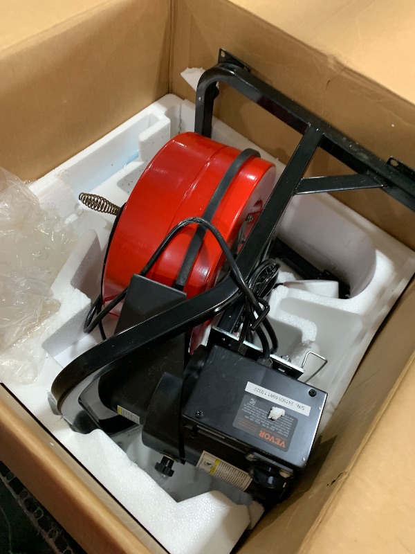 Photo 1 of VEVOR Drain Cleaner Machine 50FT x 1/2 Inch, Manual Feed Sewer Snake Auger - with Wheels, 4 Cutters & Air-activated Foot Switch for 2" to 4" Pipes