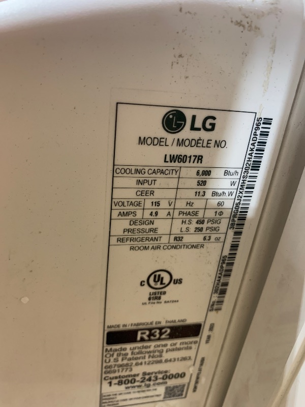 Photo 1 of LG 6,000 BTU Window Air Conditioner, 115V, Cools 250 Sq.Ft. for Bedroom, Den, Living Room, Quiet Operation, with Remote, 2 Cooling & Fan Speeds, 2-Way Air Deflection, Auto Restart, White

