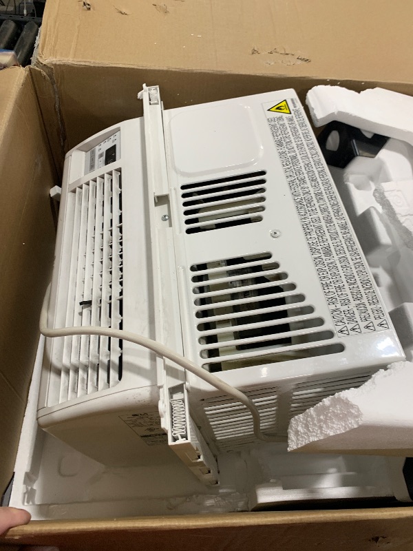 Photo 1 of LG 6,000 BTU Window Air Conditioner, 115V, Cools 250 Sq.Ft. for Bedroom, Den, Living Room, Quiet Operation, with Remote, 2 Cooling & Fan Speeds, 2-Way Air Deflection, Auto Restart, White
