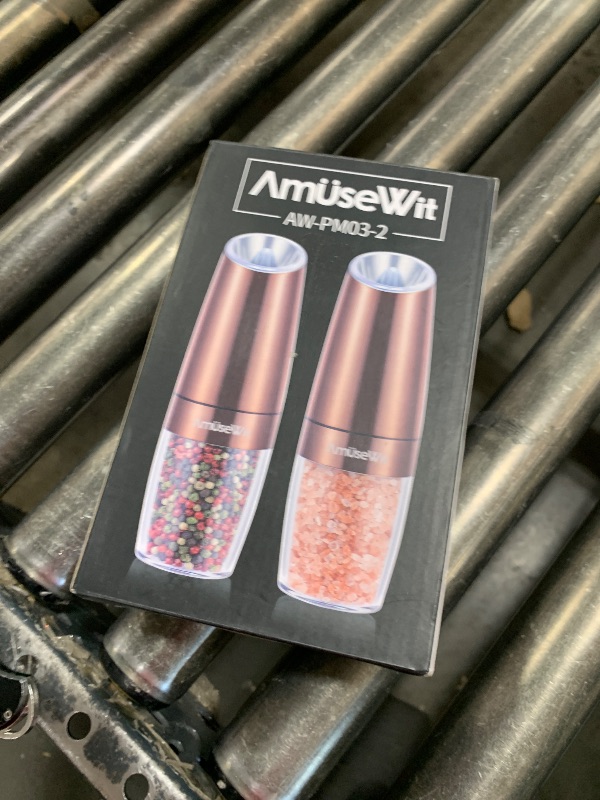 Photo 1 of AmuseWit Gravity Electric Salt and Pepper Grinder Set [White Light] Battery Operated Automatic Pepper and Salt Mills with Light,Adjustable Coarseness,One Handed Operation,Copper