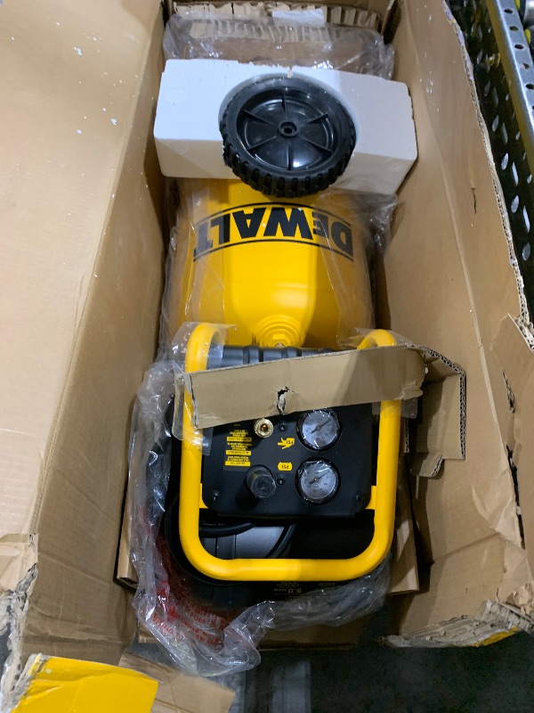 Photo 1 of DEWALT Vertical Portable Compressor, 1.9 Hp 200 Psi Oil Free High Pressure Low Noise