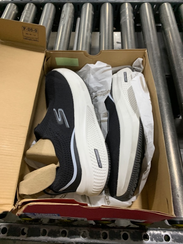 Photo 1 of Skechers Women's Go Run Elevate 2.0 Cadena Sneaker, Black/Gray, 9.5