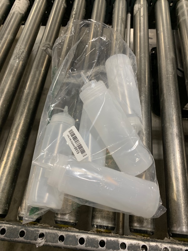Photo 1 of Bekith 12 pack 16 Oz Wide Mouth Plastic Squeeze Condiment Bottles with Twist On Cap Lids
