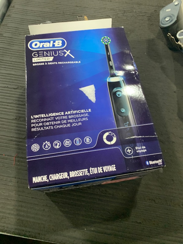 Photo 1 of Oral-B Genius X Limited Rechargeable Electric Toothbrush with 1 Replacement Brush Head, Travel Case, Midnight Black