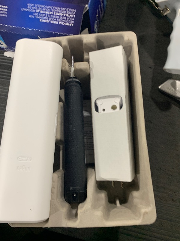 Photo 1 of Oral-B Genius X Limited Rechargeable Electric Toothbrush with 1 Replacement Brush Head, Travel Case, Midnight Black
