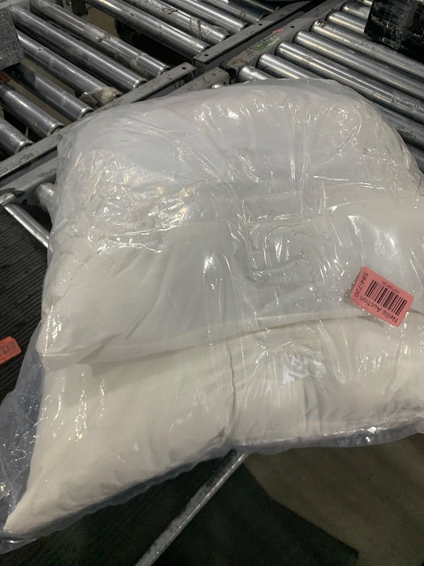 Photo 1 of two pillows white