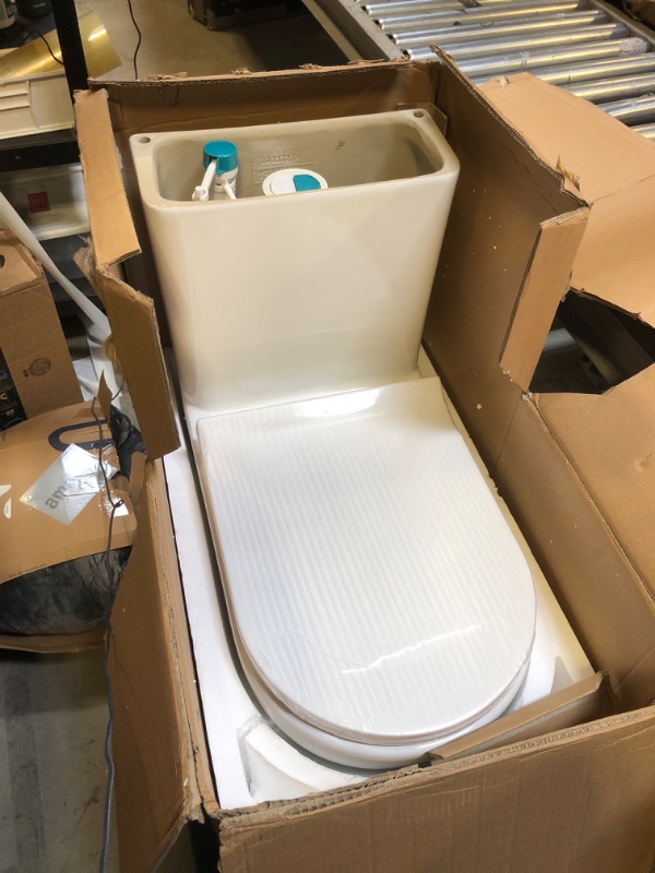 Photo 1 of Dual Flush Elongated Standard One Piece Toilet with Comfortable Seat Height, Powerful & Quiet Dual Flush Modern Toilet, 12'' Rough-In, Glossy White?6618