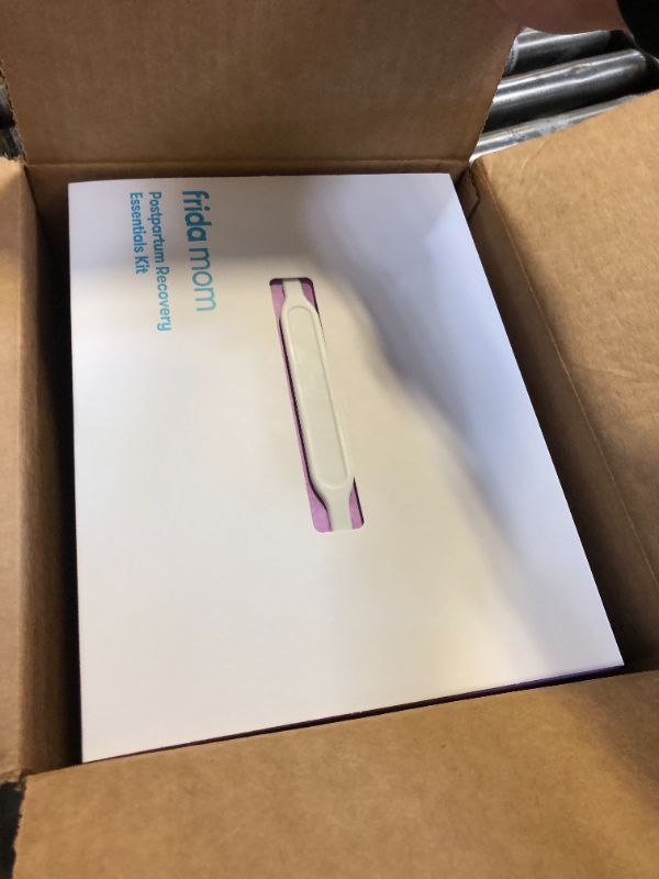 Photo 1 of Frida Mom Postpartum Recovery Essentials Kit, Includes Disposable Underwear, Instant Ice Maxi Pads, Perineal Healing Foam, Perineal Healing Pad Liners and Upside Down Peri Bottle (11pc Gift Set)