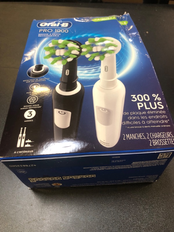 Photo 1 of Oral-B Pro 1000 CrossAction Electric Toothbrush, Black and White, 2 Count