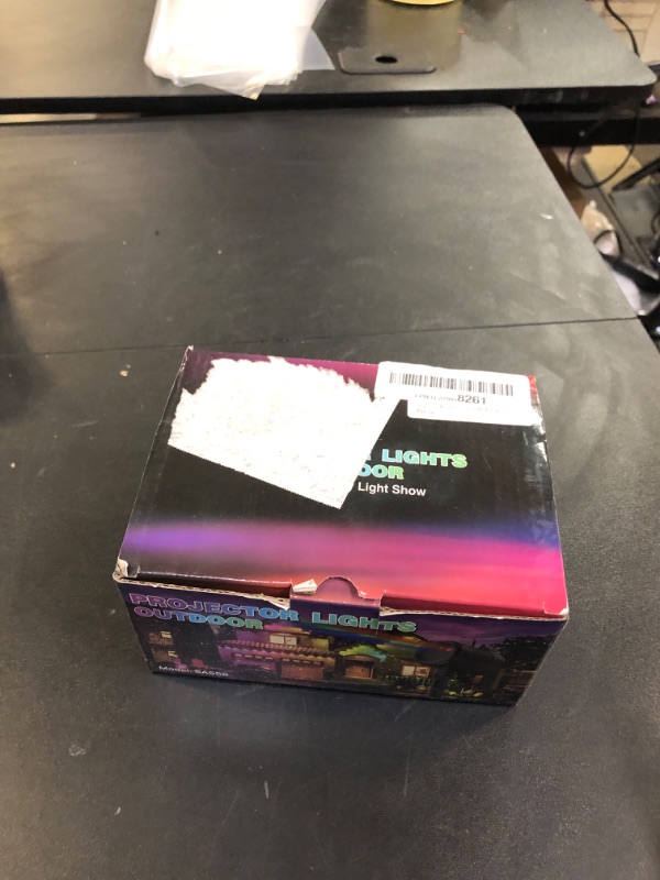 Photo 1 of Laser Christmas Projector Lights Outdoor, 3 Color Laser Projector Light, Moving Firefly Lights Show w/Remote & Timer, Waterproof Holiday Christmas Decorations for Garden Yard Party Wedding Home Decor