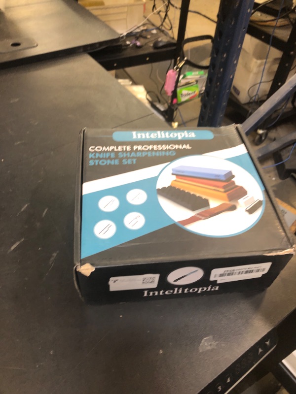 Photo 1 of Intelitopia Complete Knife Sharpening Stone Set – Dual Grit Whetstone 400/1000 3000/8000 Knife Sharpener with Leather Strop, Flattening Stone, Bamboo Base, 3 Non-slip Rubber Bases & Angle Guide