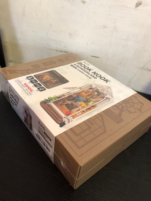 Photo 1 of ROBOTIME Book Nook Kit DIY Miniature House with LED Light Booknook Bookshelf Insert Decor Wooden Bookend Craft Hobby Diorama Kit Unique Gifts (Garden House)