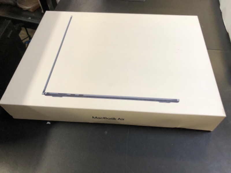 Photo 1 of Apple 2024 MacBook Air 15-inch Laptop with M3 chip: Built for Apple Intelligence, 15.3-inch Liquid Retina Display, 16GB Unified Memory, 256GB SSD Storage, Backlit Keyboard, Touch ID; Midnight