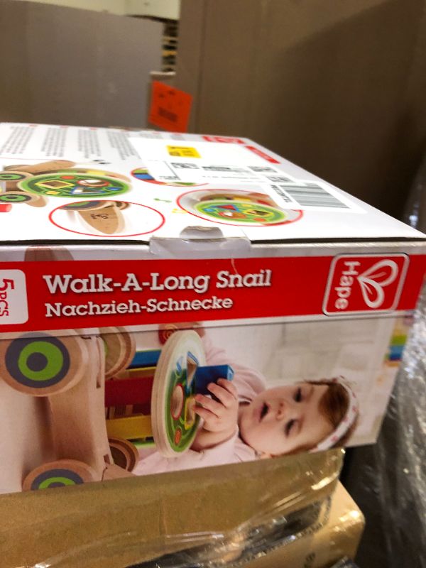 Photo 2 of Hape Walk-A-Long Snail Pull Toy |Award Winning Toddler Wooden Push and Pull Toy with Removable Color