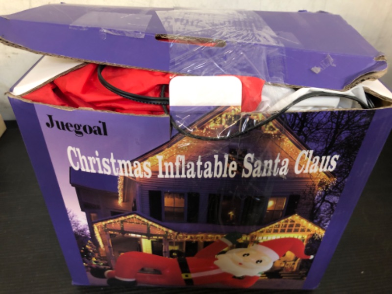 Photo 1 of Juegoal Christmas Inflatables Outdoor Decorations, 12FT Long Inflatable Xmas Santa Claus, Lighted Blow Up Giant Lying Santa with Built in LED Lights, Light Up Holiday Winter Lawn Yard Garden Decor