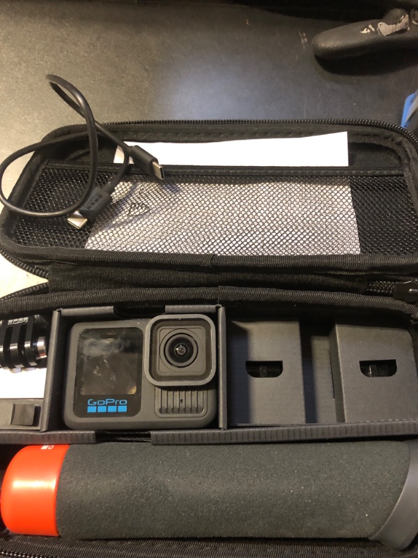 Photo 2 of GoPro HERO13 Black Accessory Bundle - Includes The Handler, 2 Enduro Batteries, 2 Curved Adhesive Mounts, 64GB SanDisk MicroSD Card, and Carrying Case