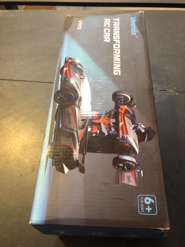 Photo 1 of V992 Transform Remote Control Car,Transform Robot RC Cars,1:14 Scale,2-in-1 Robot Toy Car with Sound & Light Effects,Gesture Sensing,Automatic Deformation,Birthday Gift Toys for Boys and Girls