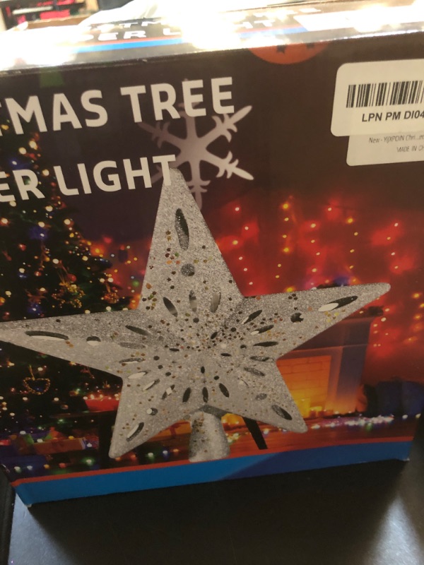 Photo 1 of **SOLD FOR PARTS**YIJXPOIN Christmas Tree Topper Lighted with 8 Projection Modes, Christmas Star Tree Topper Built-in LED Rotating Lights, 3D Gold Star Tree Top Glitter Projector for Xmas Party Holiday Decorations