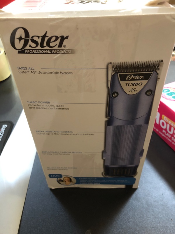 Photo 2 of Oster A5 Dual Speed Grooming Clipper with Detachable Cryogen-X Blades #10 and #7F 7 Piece Universal Combs Guides Set