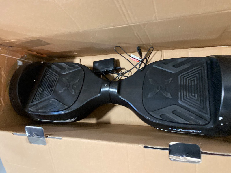 Photo 2 of Hover-1 Drive Electric Hoverboard | 7MPH Top Speed, 3 Mile Range, Long Lasting Lithium-Ion Battery, 6HR Full-Charge, Path Illuminating LED Lights