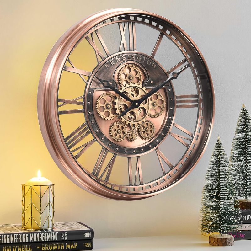 Photo 1 of CLXEAST Large Roman Numeral Wall Clock with Moving Gears,Farmhouse Copper Rose Gold Metal Wall Clock for Living Room Decor (21 Inch)