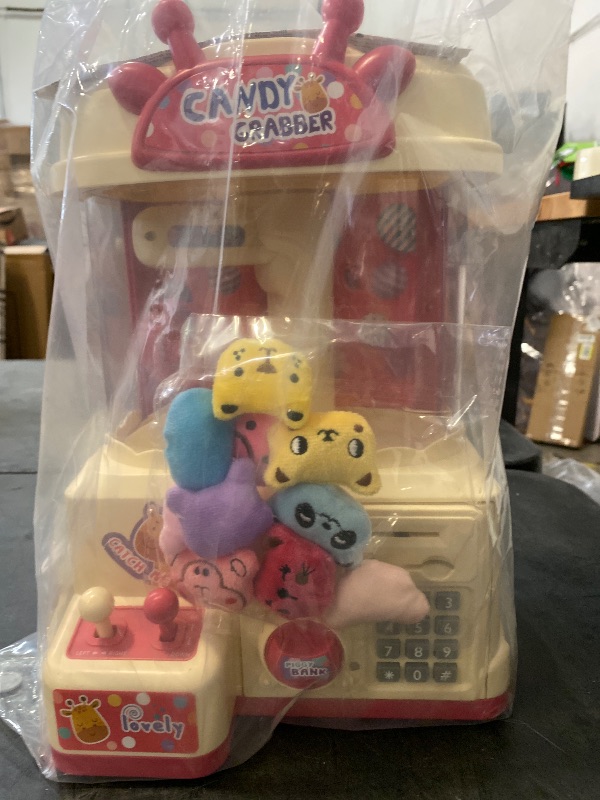 Photo 1 of Large Claw Machine for Kids, Claw Machine Toy with Piggy Bank, with Music & Light, Party Birthday for 3-14 Boys Girls Gift, 10 Mini Plush Toys, 5 Game Bank Notes, 10 Game Coin,Pink