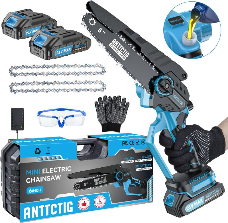 Photo 1 of Mini Chainsaw Cordless, 6 inch Small Electric Chainsaw Battery Powered, Handheld Mini Chain Saw with 2 Batteries&2 Chains, Hand Saws for Branch Wood Cutting Tree Trimming (UPGRADED VERSION), Blue