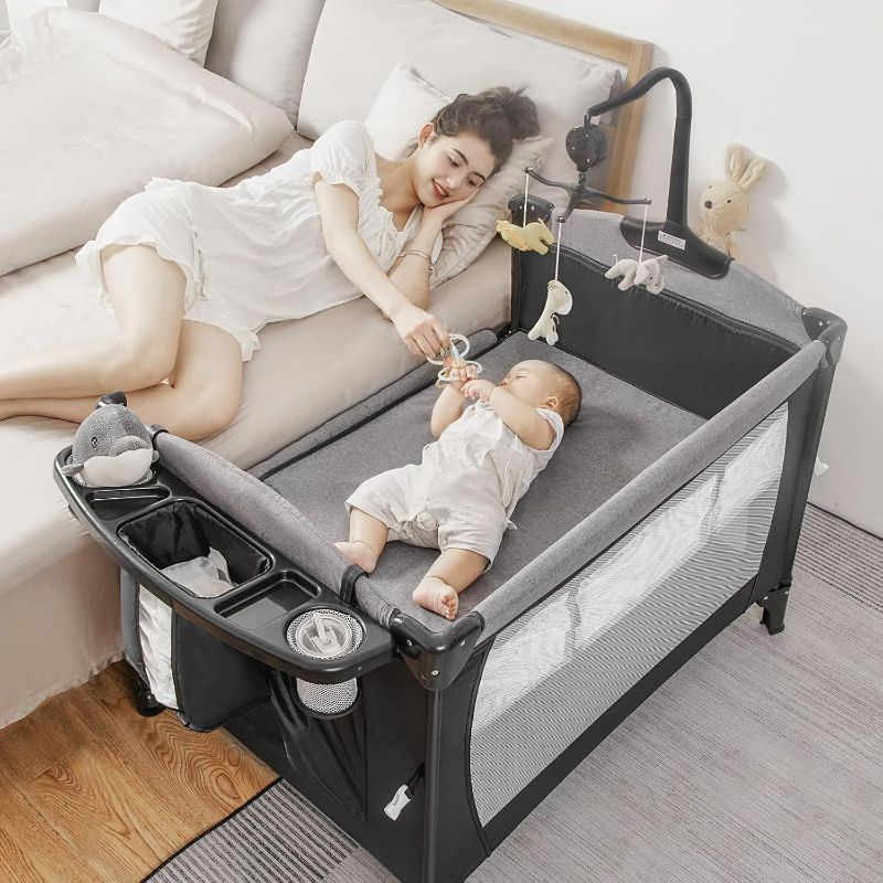 Photo 1 of 5-in-1 Pack and Play, Baby Bassinet Bedside Sleeper with U-Shaped Diaper Changer, Portable Baby Playard for Newborn Toddlers, Baby Crib with 4 Adjustable Height, Ca